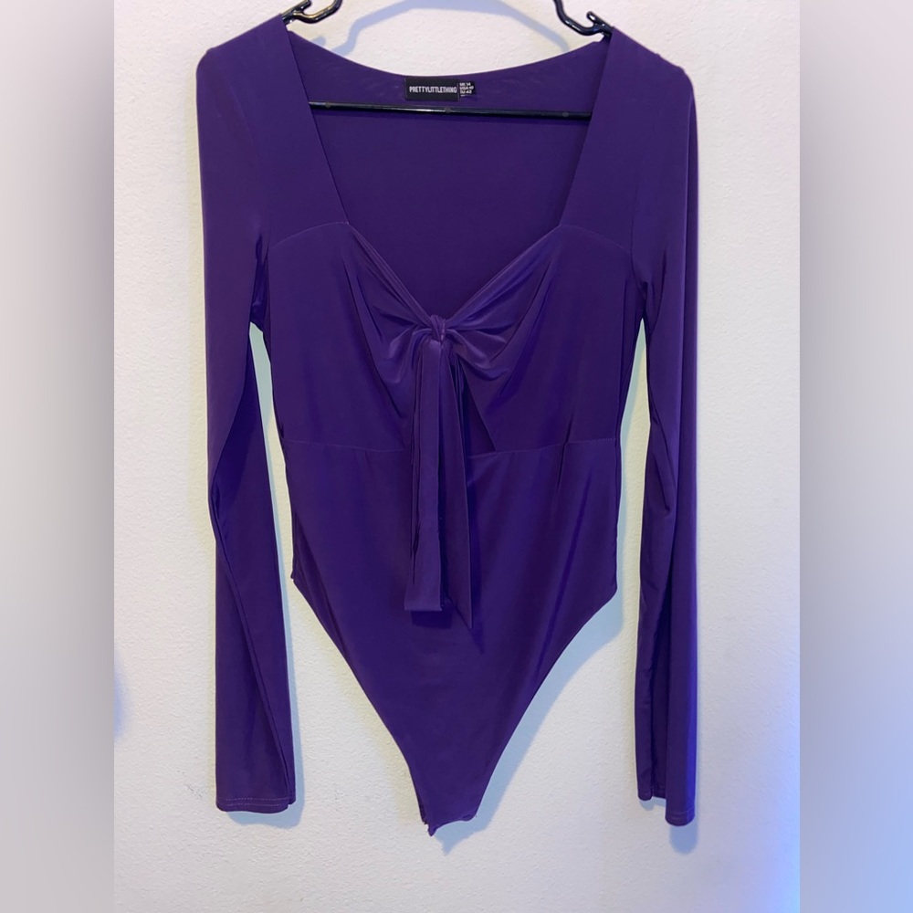 Purple body suit